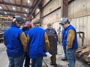 Cives Steel Welder instructs students