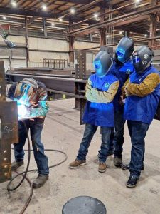 Students Watching Welding Demonstration