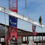 The final beam of the South Brooklyn Marine Terminal project contains signatures from the crews that dedicated themselves to this project