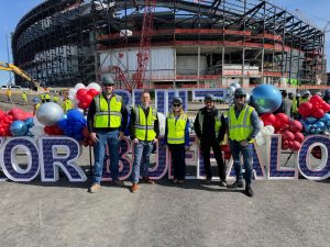 Cives steel team members in a group photo to celebrate the Topping out ceremony.