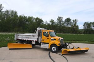 Aerial view of a truck with the 11 foot rear mounted wing