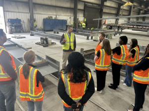 American Institute of Steel Construction members being given a tour of the Mid West Division facility