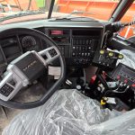 Interior view of the new Champion, NY truck, the seat is wrapped in protective plastic.
