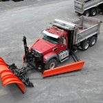 Overhead view of Champion, NY truck featuring a front plow and side plows on both right and left
