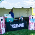 Photo of the raffle booth at the 40th anniversary event showing the various prizes available to win.